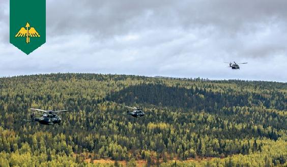 Kolme NH90-kuljetushelikopteria lentotehtävässä