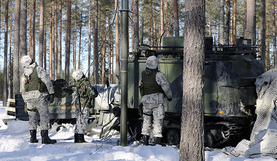 Soldiers and tracked vehicle