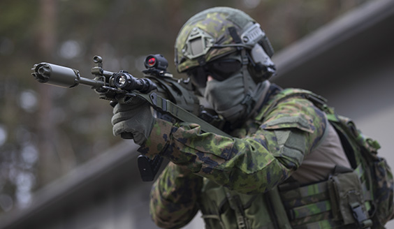 Soldier aiming with an assault rifle