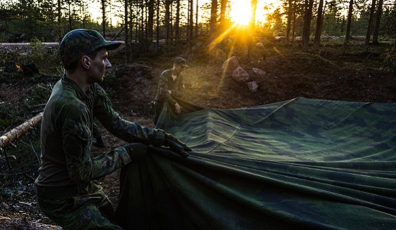 Conscripts set up a tent