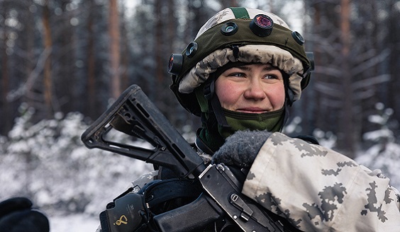 woman soldier in wood