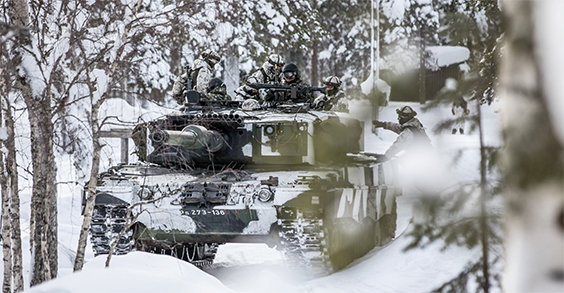 Tank in a snowy forest