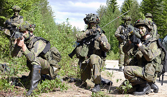 Soldiers aiming with launchers