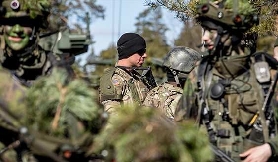 Happy soldiers in combat gear