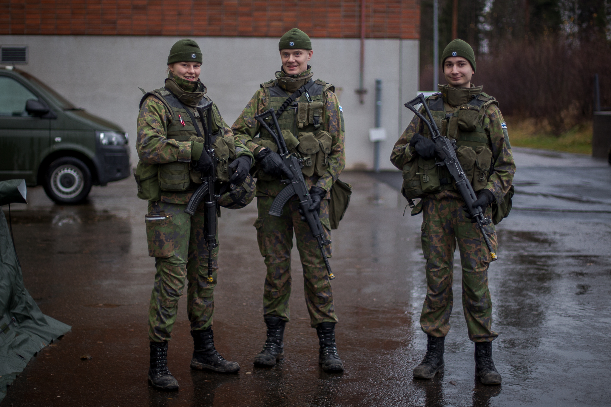 Three soldiers in combat gear