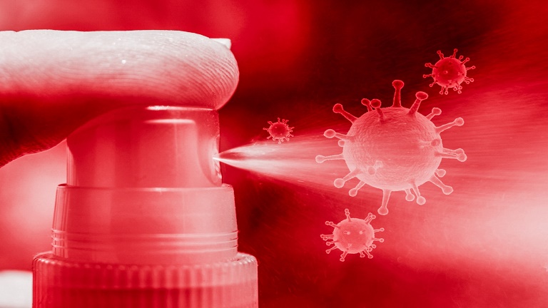 Koronaviruksesta kuvituskuva, jossa suihkautus kohti koronavirusta.